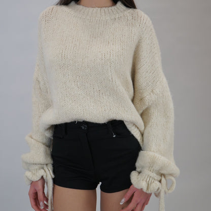 Maglione fiocco color